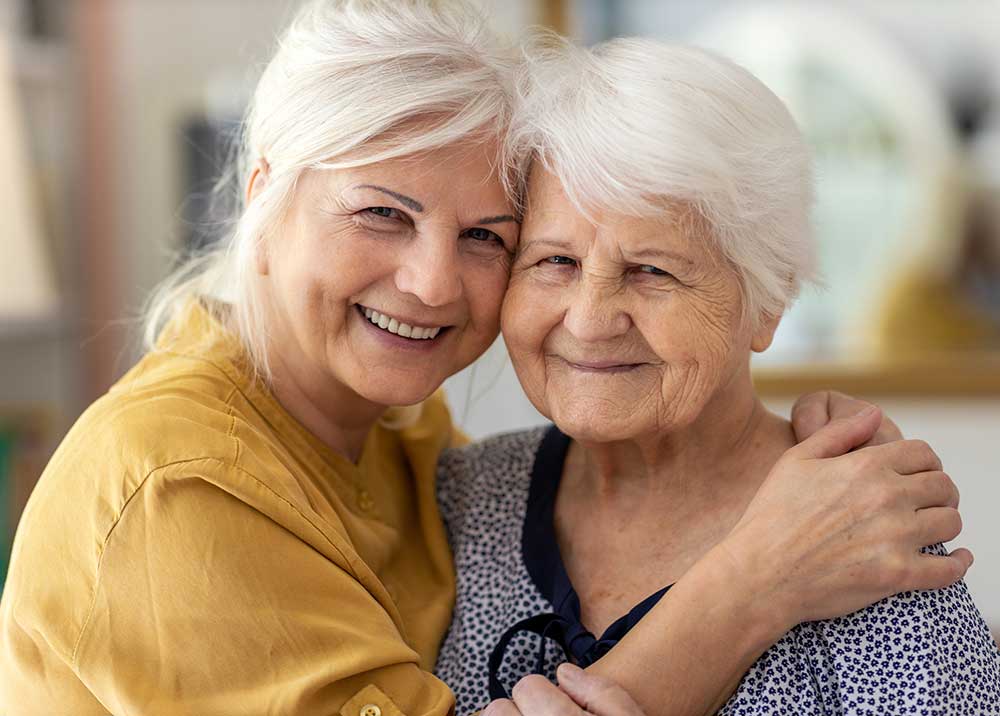 Daughter and mother smiling